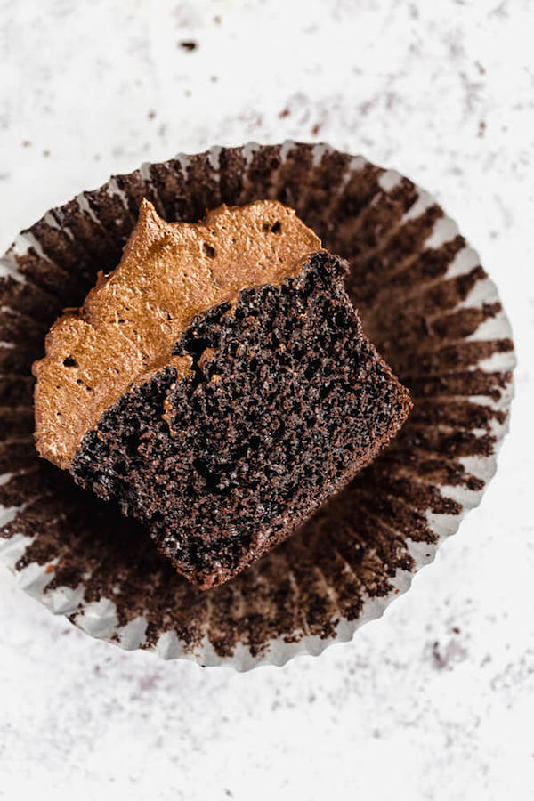 dark chocolate cupcakes topped with dark chocolate ganache frosting