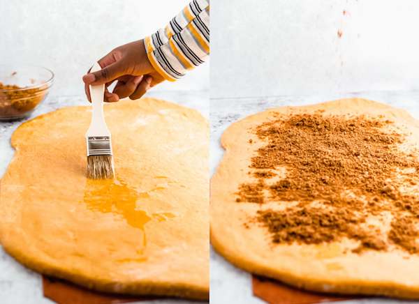 spreading melted butter and sprinkling on cinnamon brown sugar onto pumpkin dough