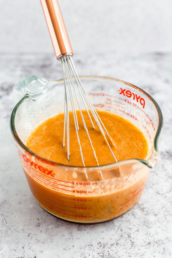 wet ingredients for pumpkin cinnamon roll dough