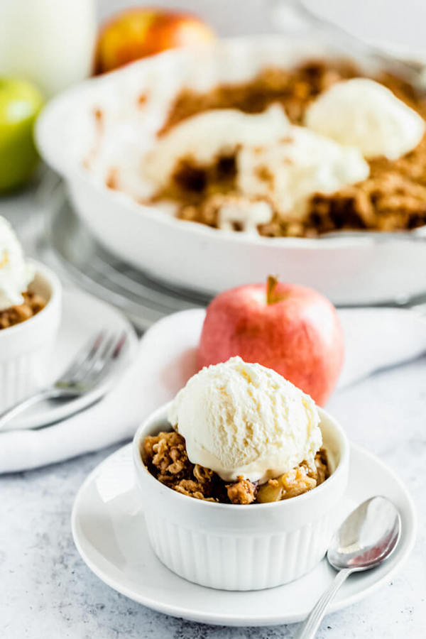 apple crisp topped with vanilla ice cream 