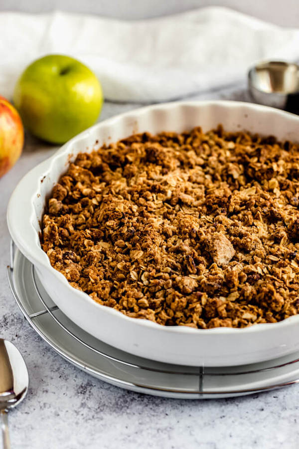 baked apple crisp on a round wire rack