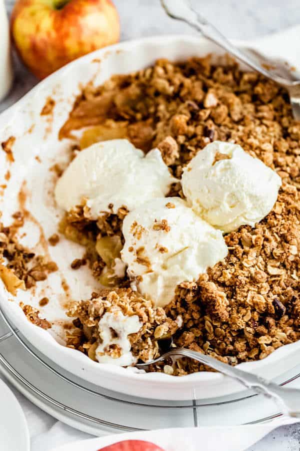 apple crisp topped with vanilla ice cream 