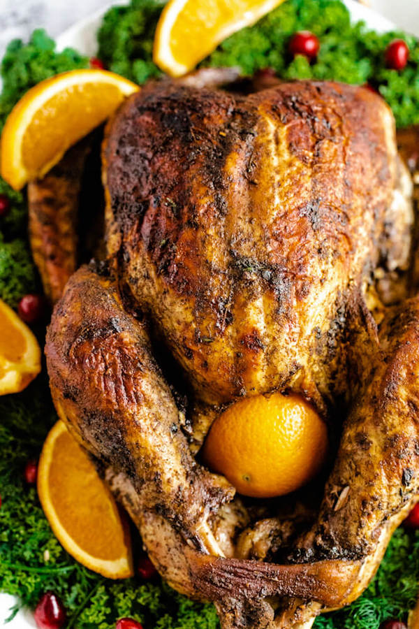 roasted turkey on a decorative turkey platter