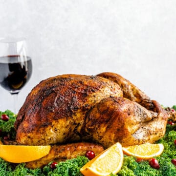 roasted turkey on a decorative turkey platter