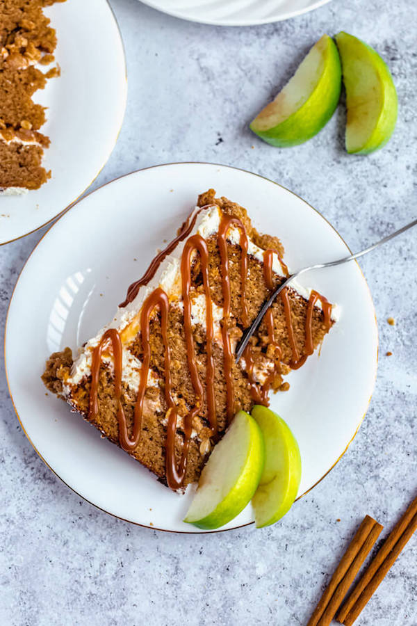 slice of apple crumble cake with salted caramel sauce drizzle 