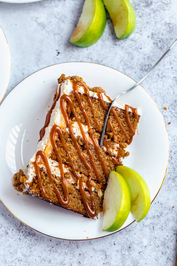 slice of apple crumble cake with salted caramel sauce drizzle 