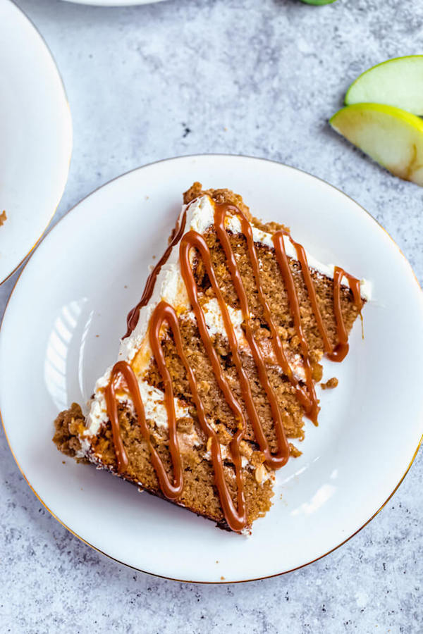 slice of apple crumble cake with salted caramel sauce drizzle 