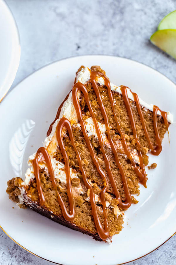 slice of apple crumble cake with salted caramel sauce drizzle 