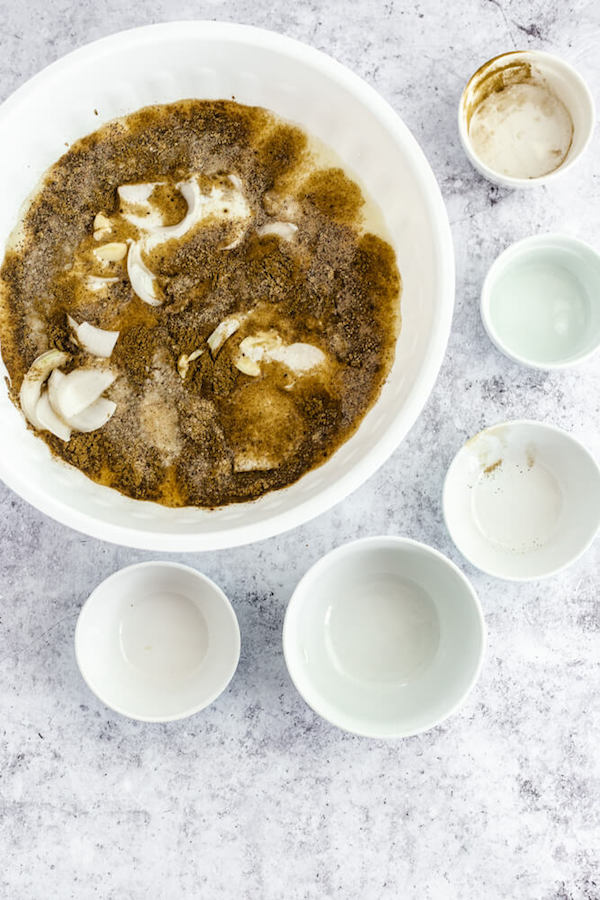 combining buttermilk brine ingredients in a large bowl