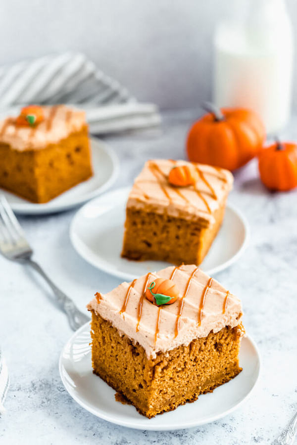 slices of pumpkin sheet cake on small plates