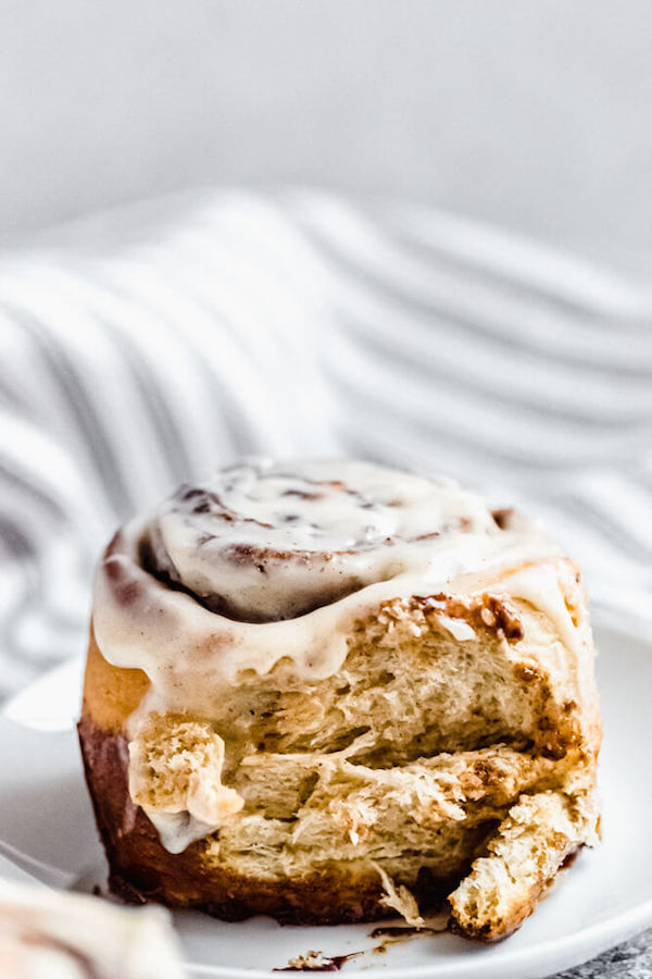 chai cinnamon roll on an appetizer plate