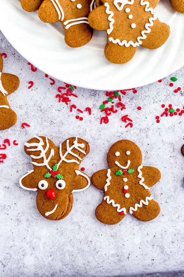 one reindeer cookie and one decorated man cookie