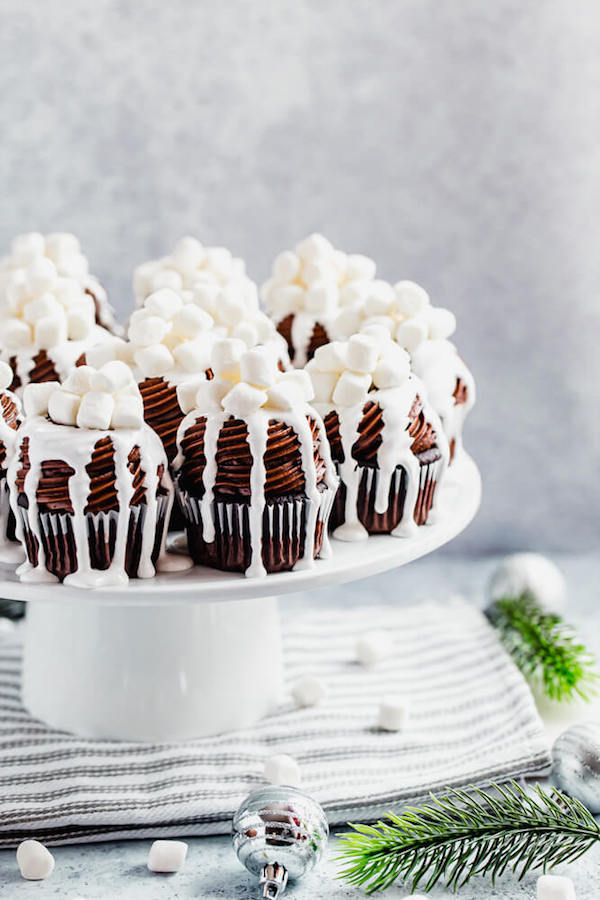 hot chocolate cupcakes on a cake stand
