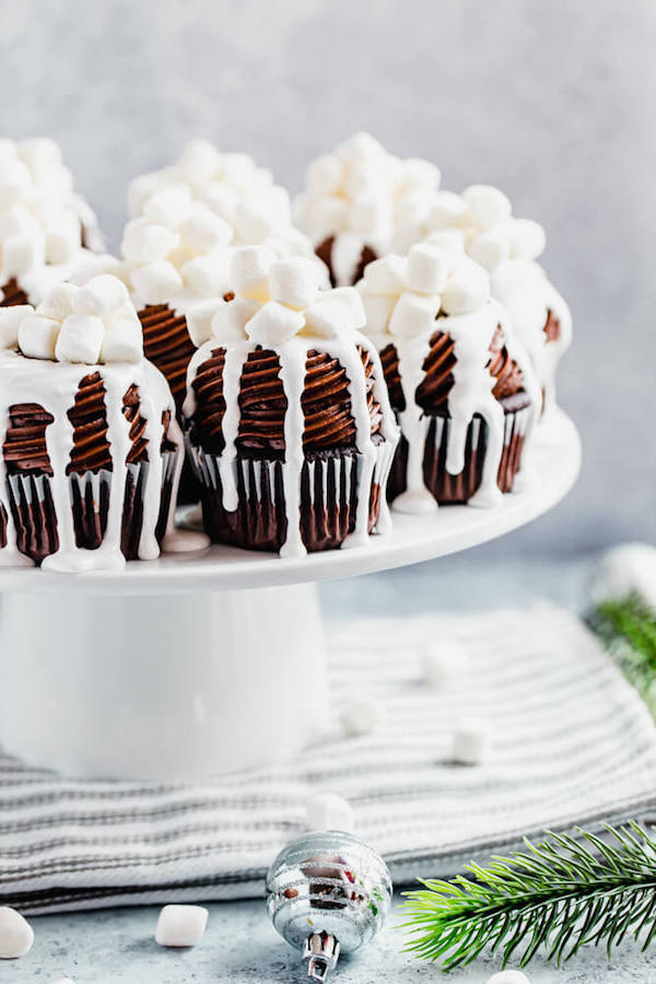 hot chocolate cupcakes on a cake stand