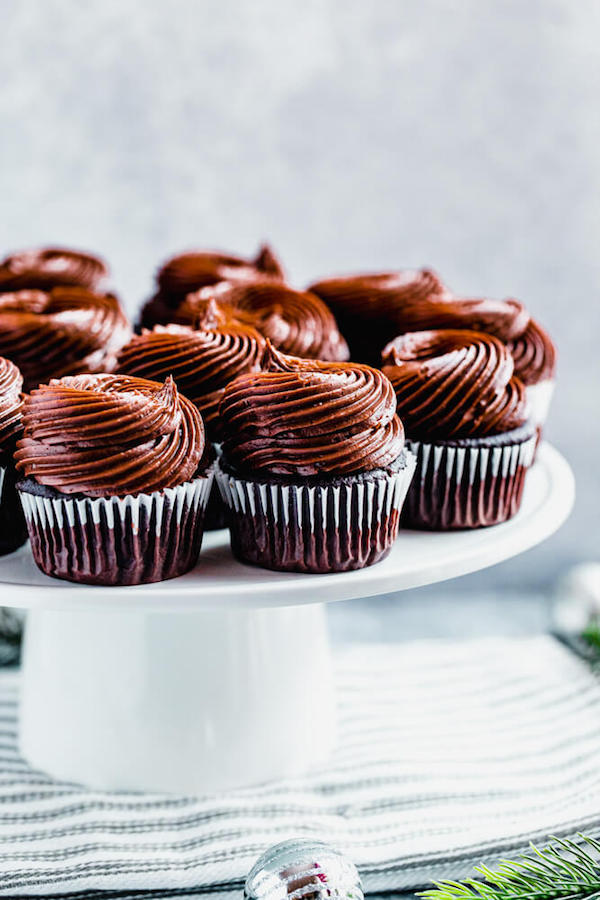 chocolate cupcakes on a cake stand