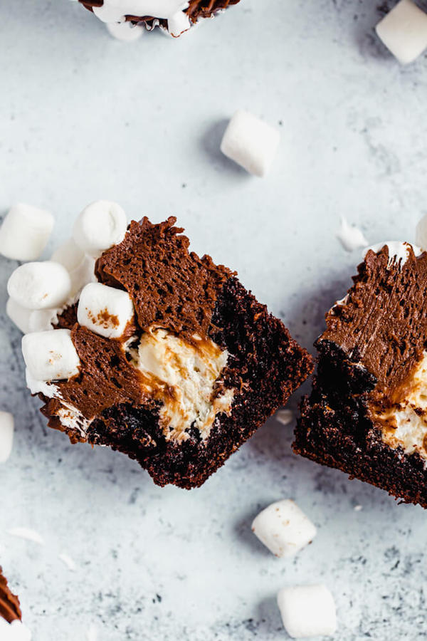 hot chocolate cupcake cut in half with marshmallow filling 