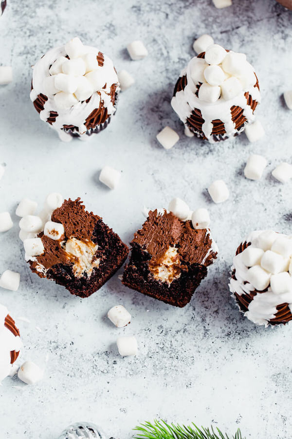 hot chocolate cupcake cut in half with marshmallow filling 