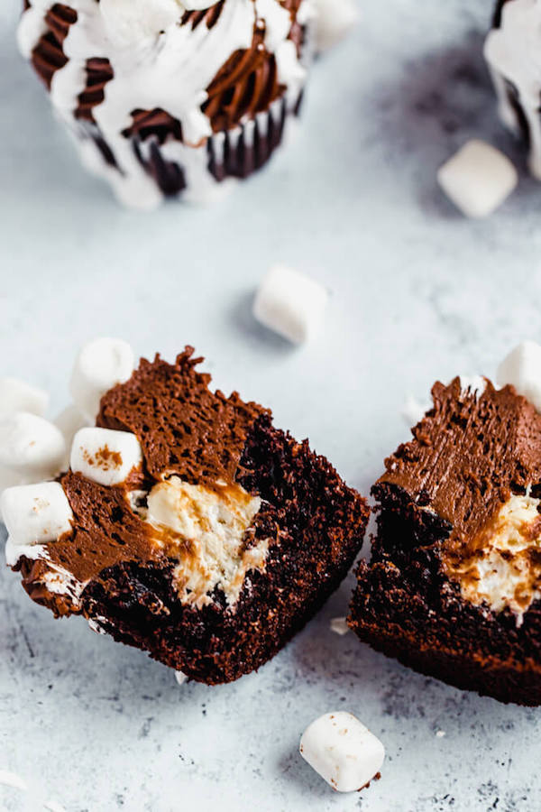 hot chocolate cupcake cut in half with marshmallow filling 