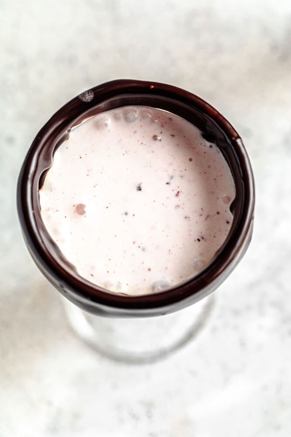 top view of milkshake inside a ganache dipped glass