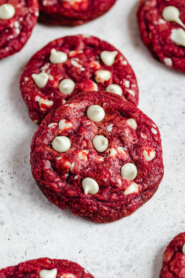 close up of red and white cookies