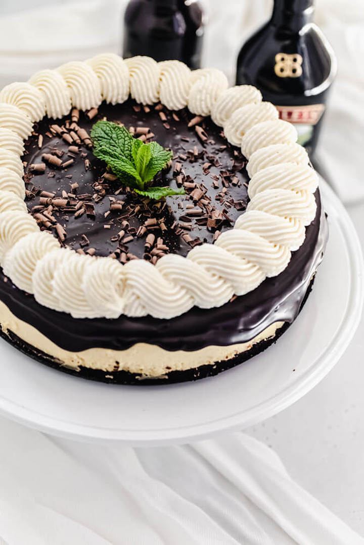 cheesecake on a white cake stand