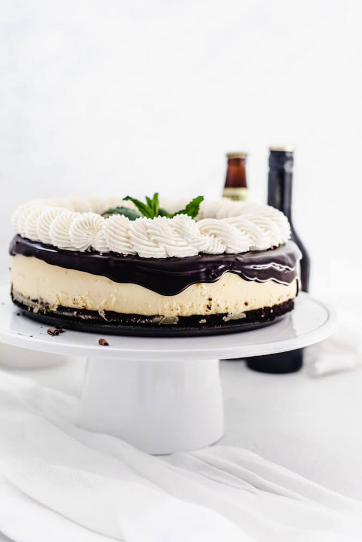 cheesecake on a white cake stand