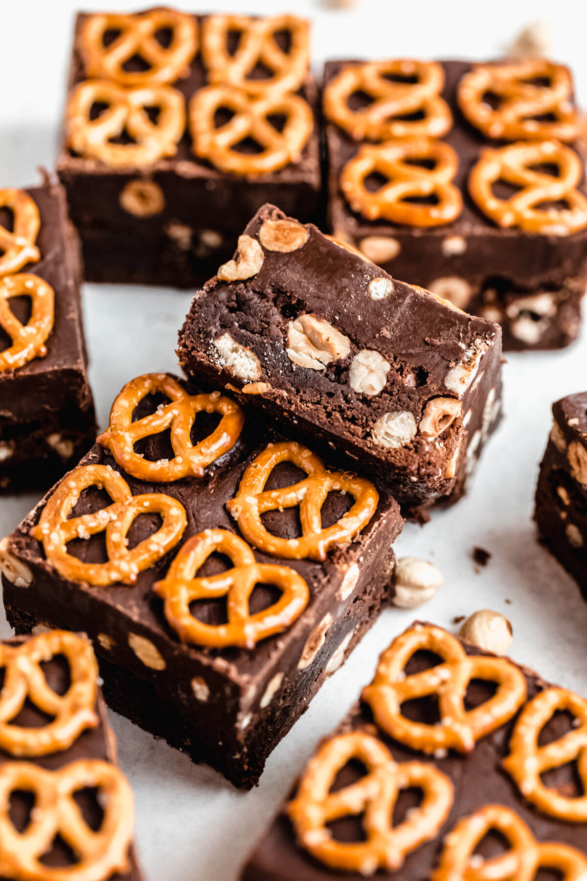 close up of fudge brownie leaning onto another brownie