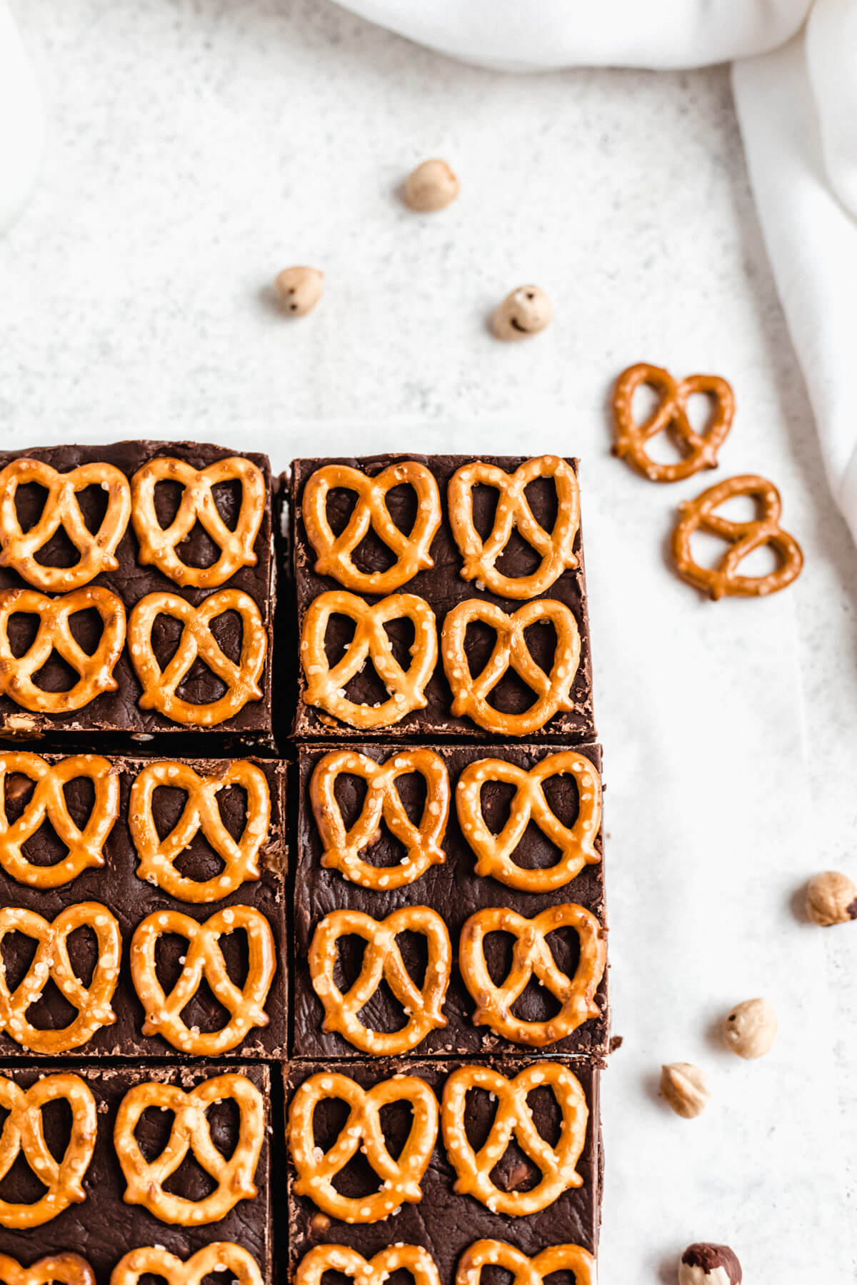 close up top right view of fudge and pretzel brownies