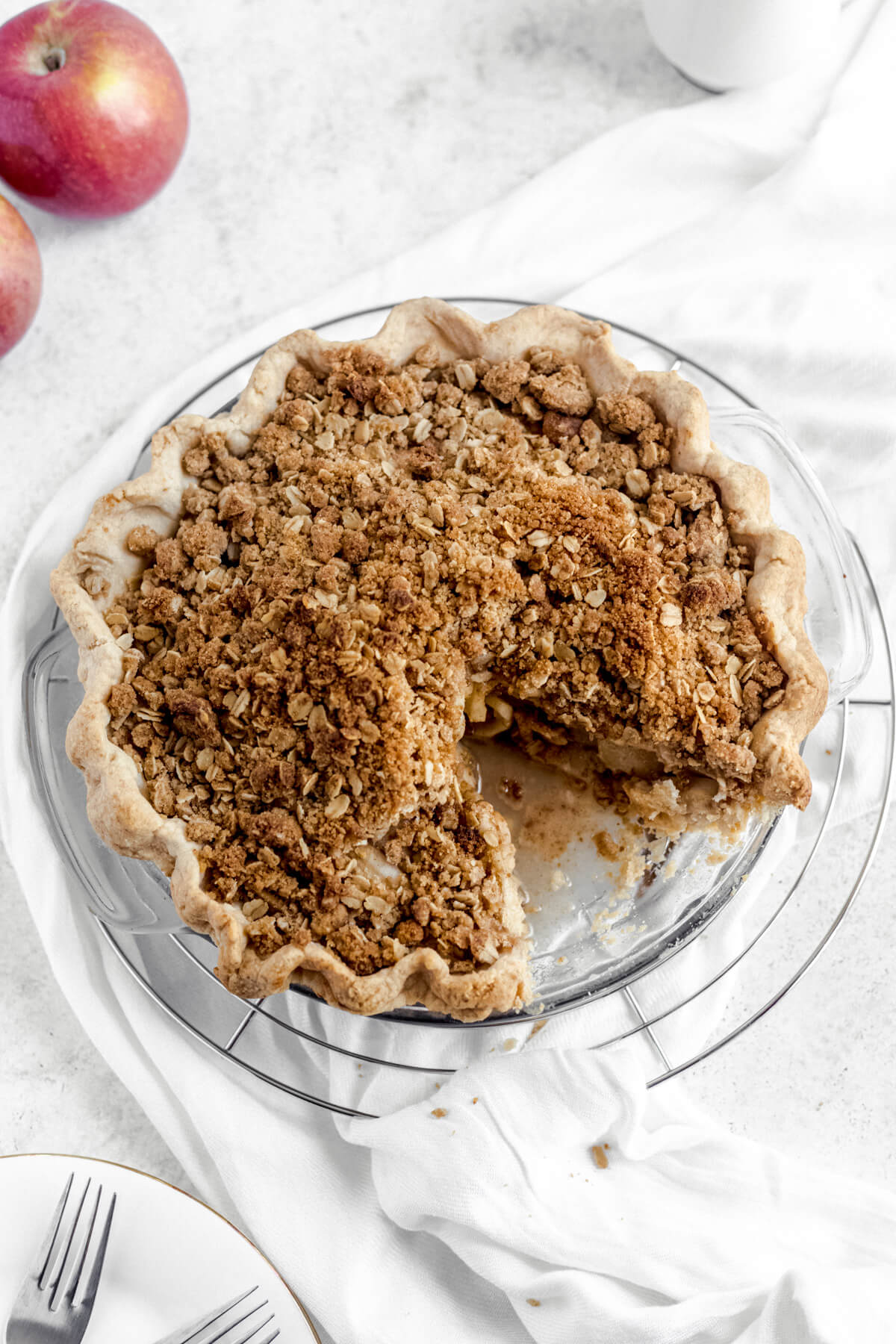 crumble topped apple pie with a slice taken out