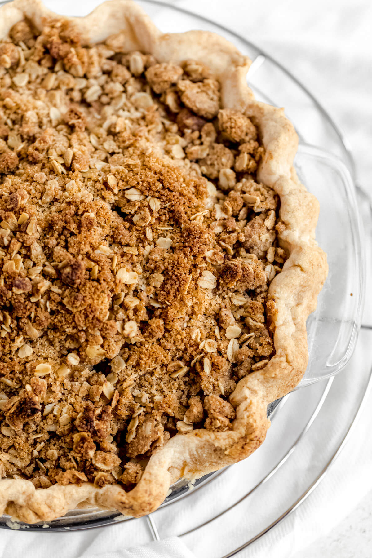 close up of baked crumble topped pie