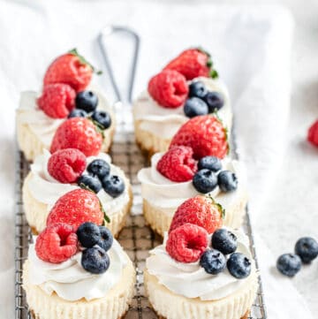 six cheesecake cupcakes on a safety grater