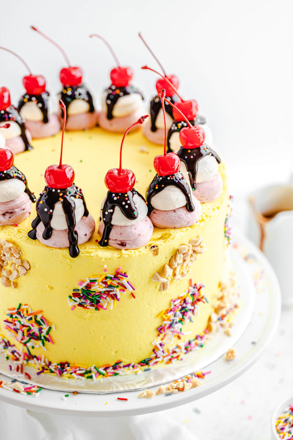 close up of sundae cake on a cake stand