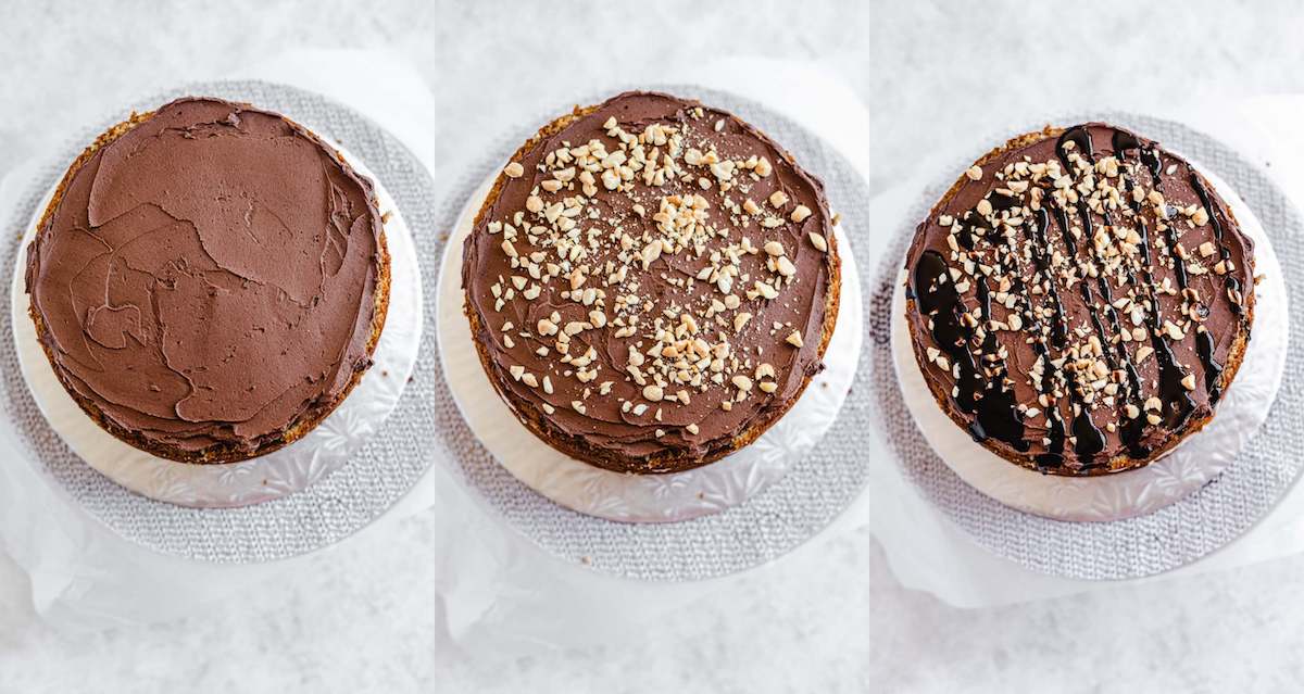 chocolate frosting, peanuts and chocolate sauce on a cake layer