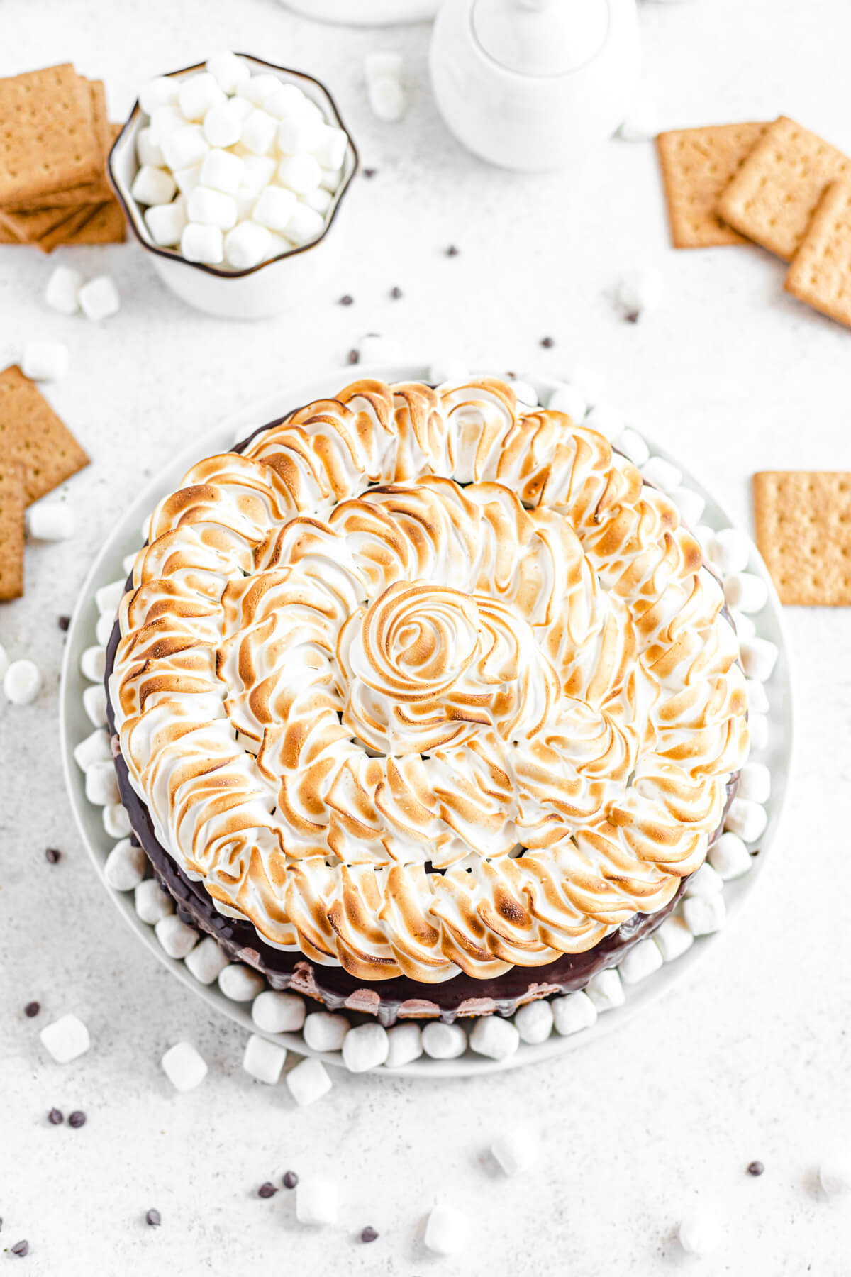 top view of toasted meringue topping on ice cream cake