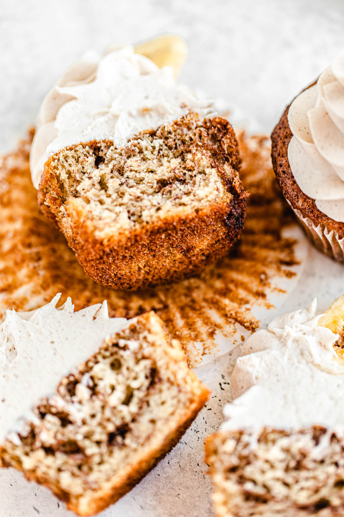 close up of multiple halved cinnamon swirl cupcakes