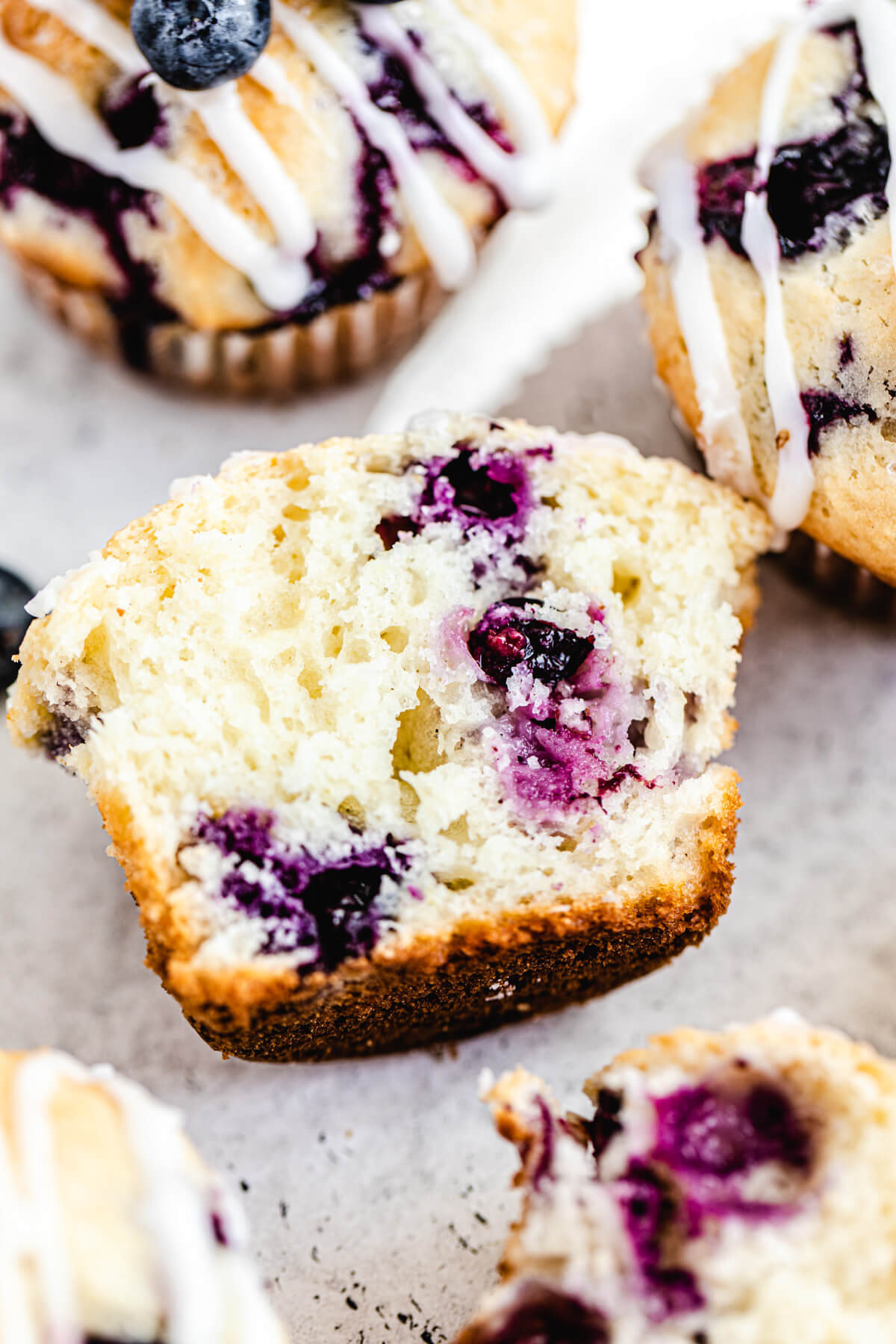 close up of halved blueberry muffin 