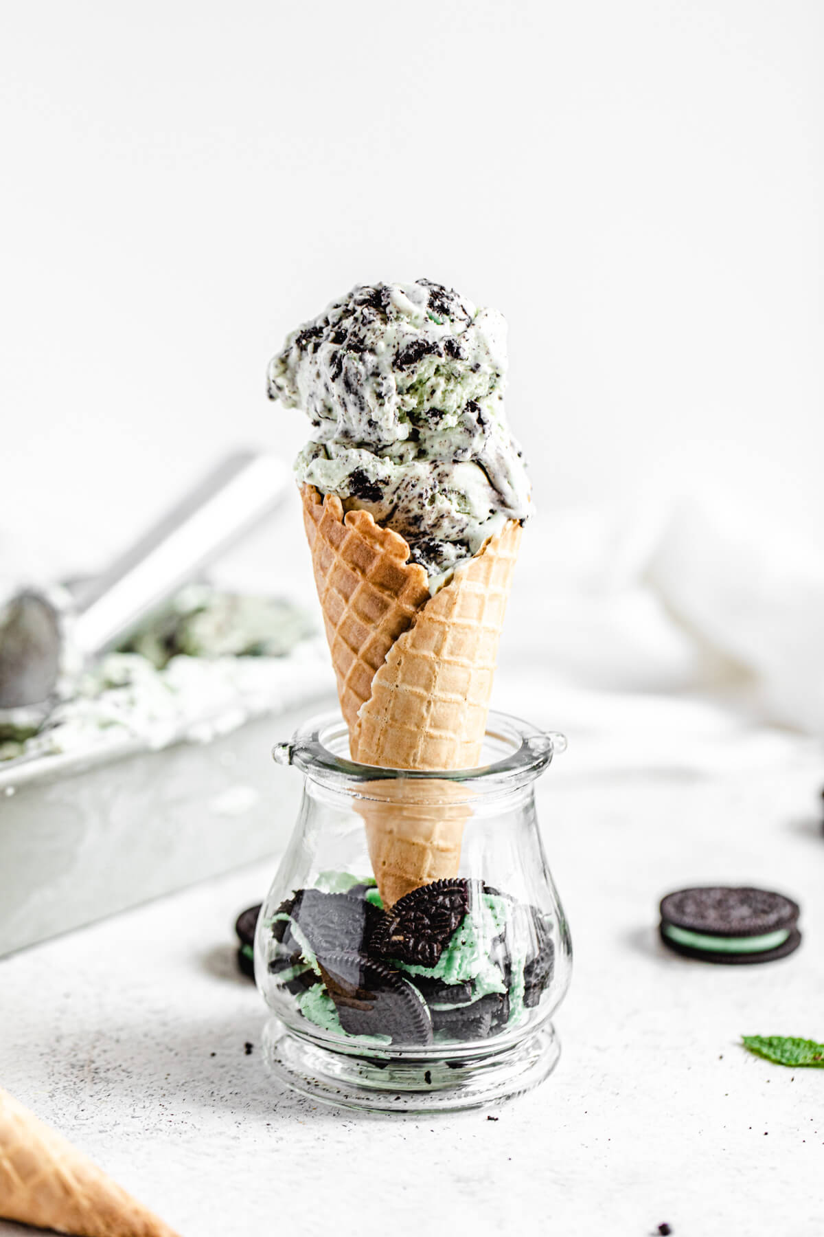 ice cream cone in a jar filled with chopped Oreos