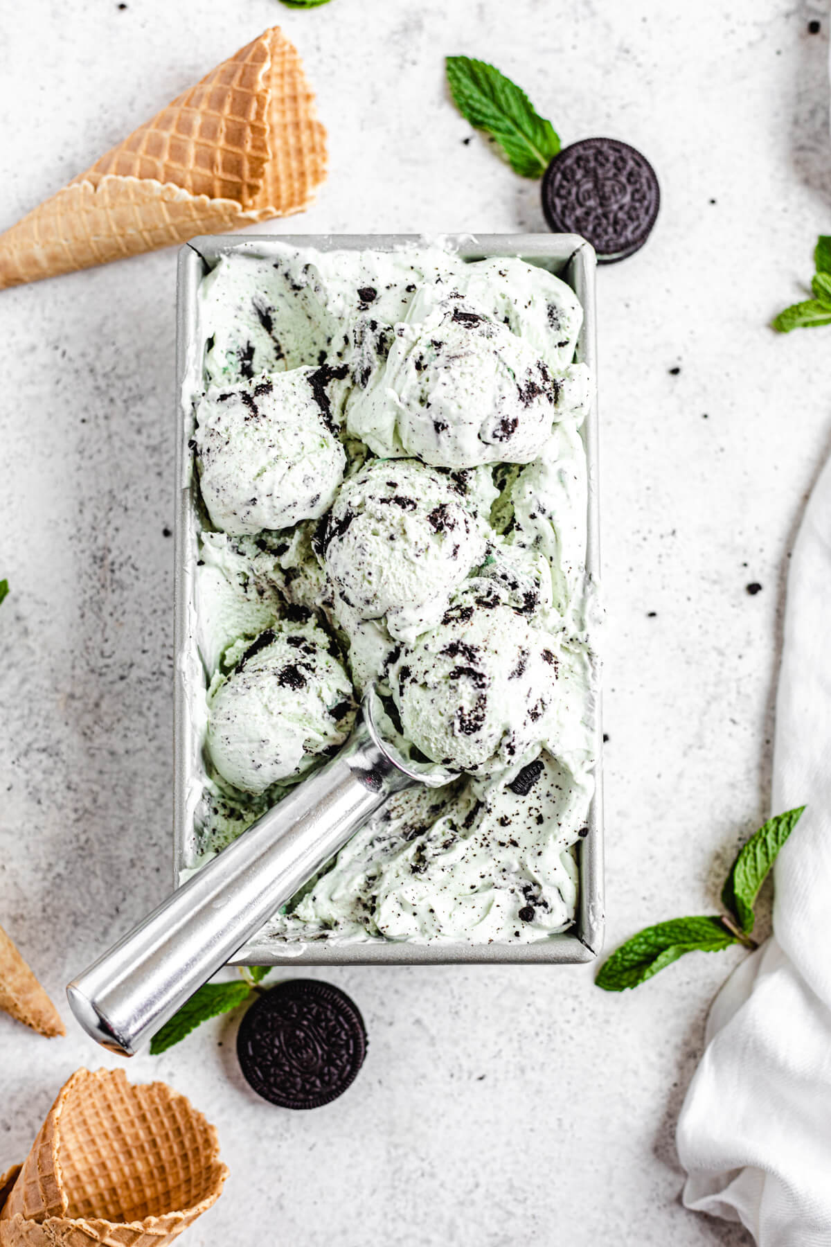 ice cream scoops in loaf pan with an ice cream scoop