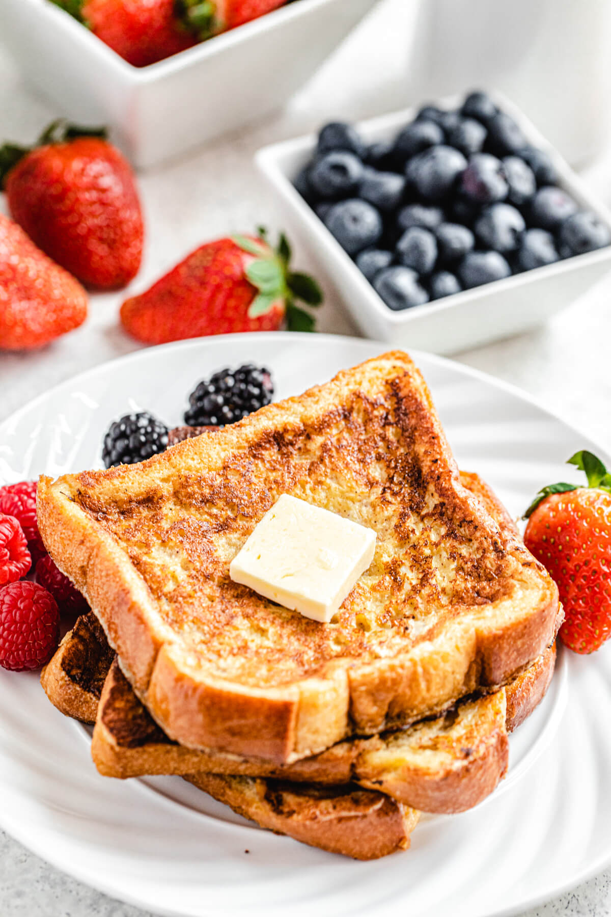 plain French toast with piece of butter on top