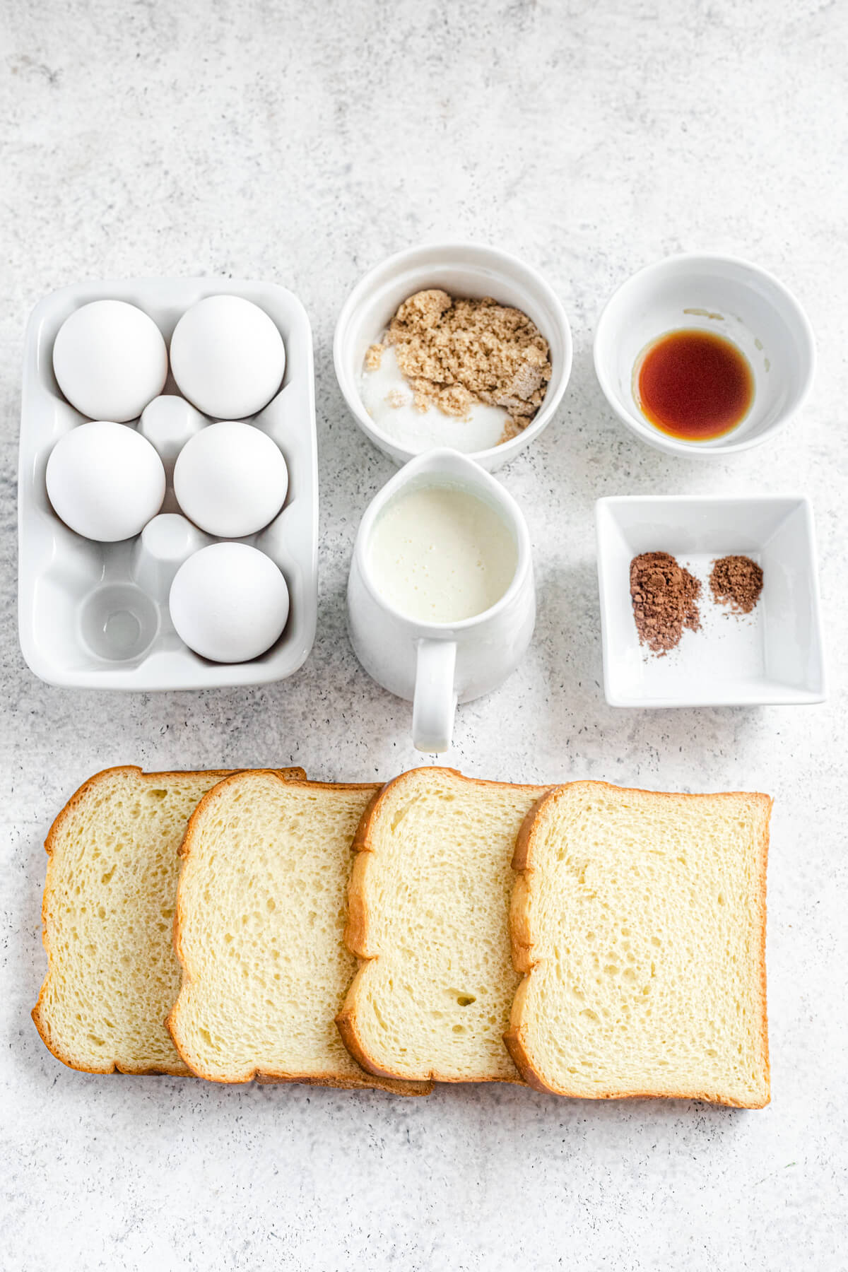 eggs, brown and white sugar, vanilla, milk and cream, cinnamon and nutmeg, and brioche slices