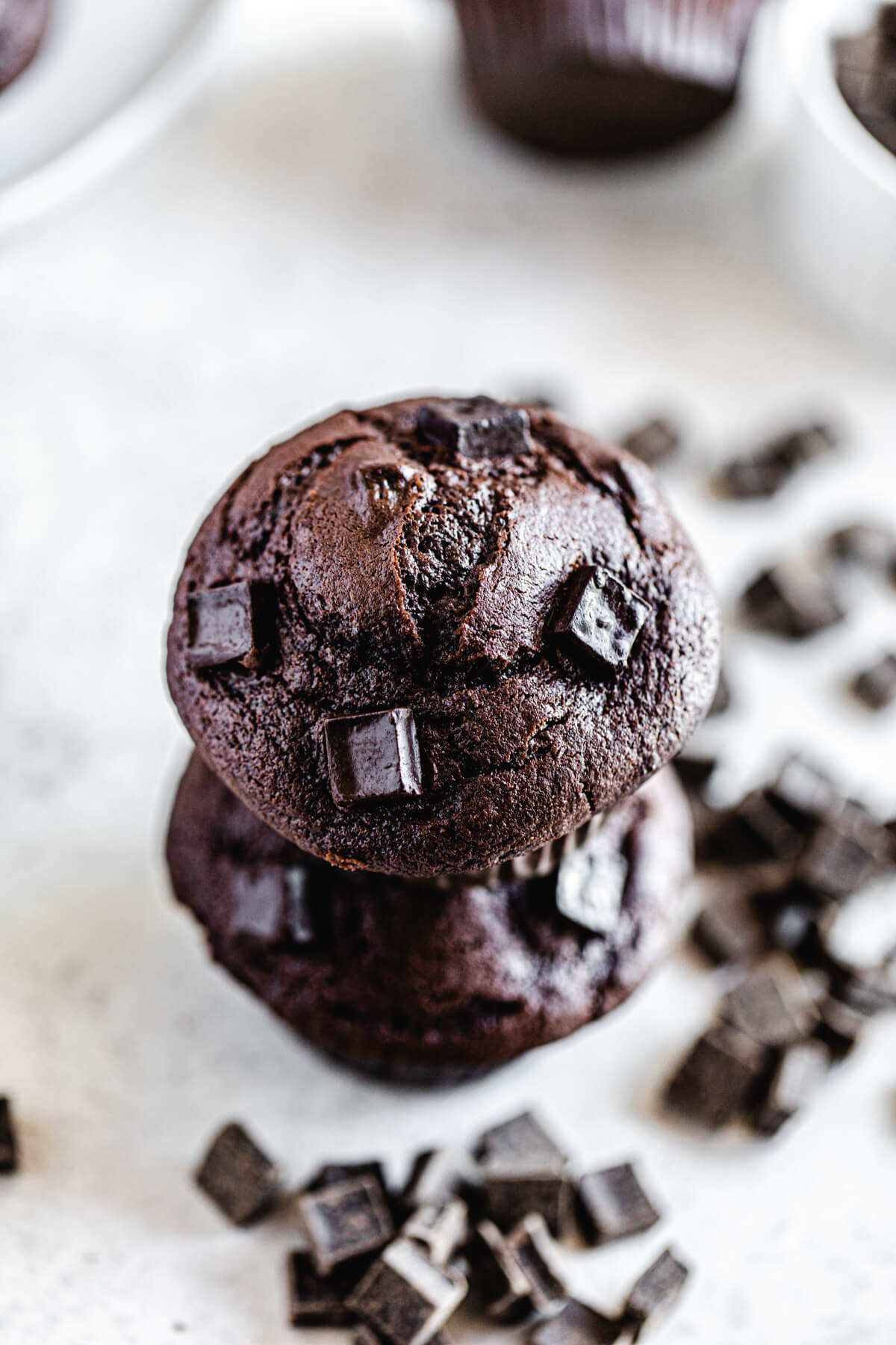 close up of a muffin stacked on another one