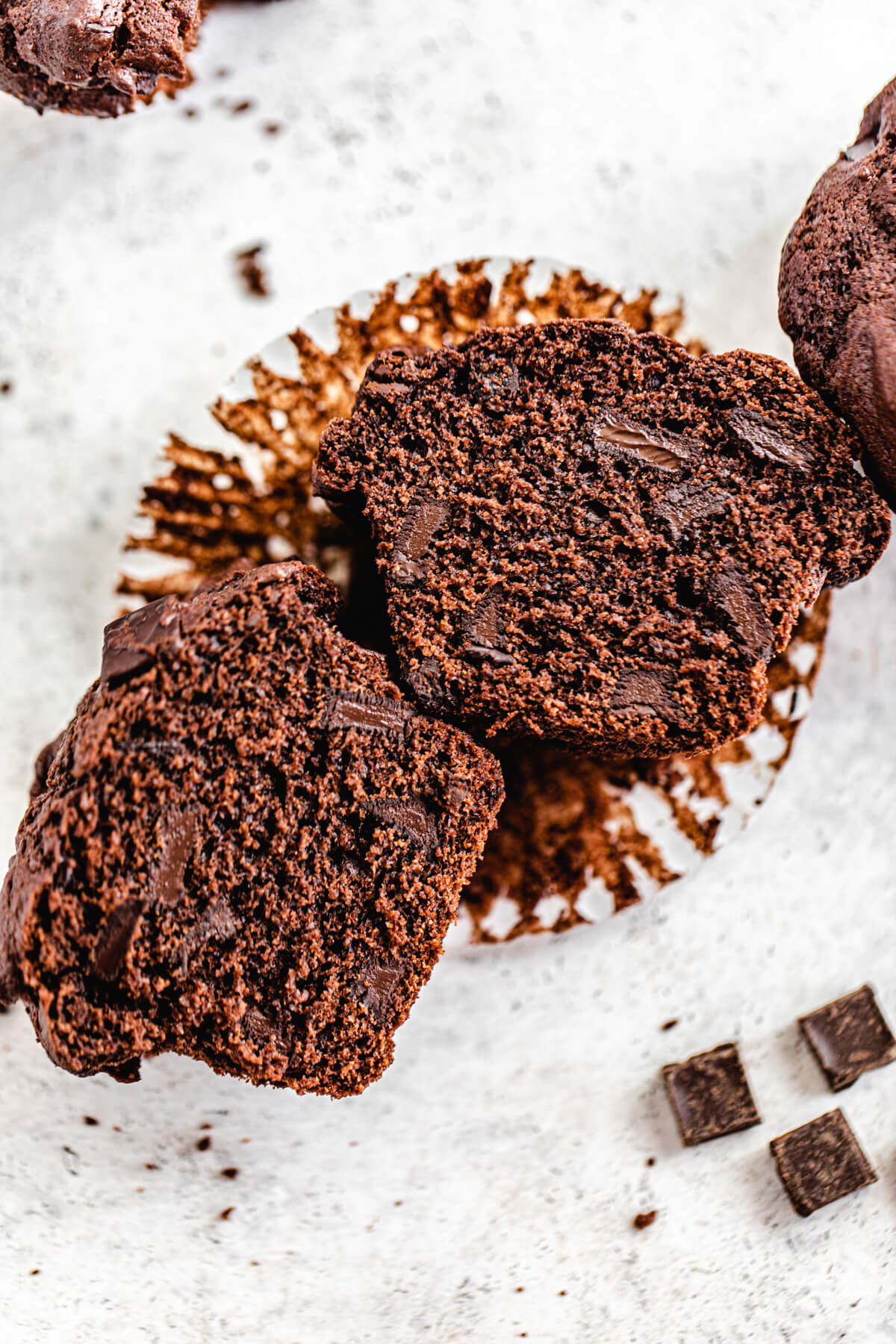 halved muffins on a cupcake liner