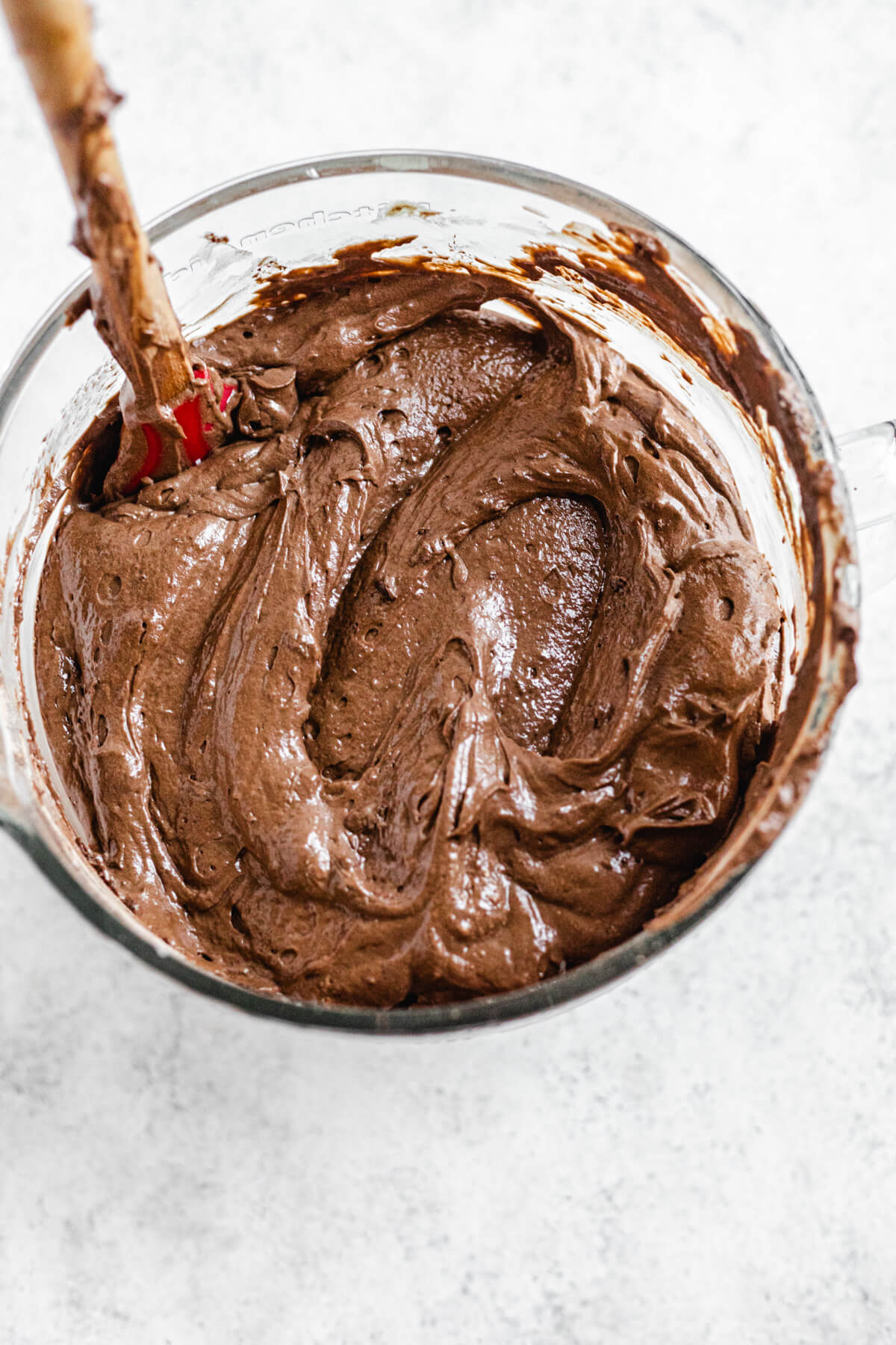 chocolate cake batter in a glass bowl