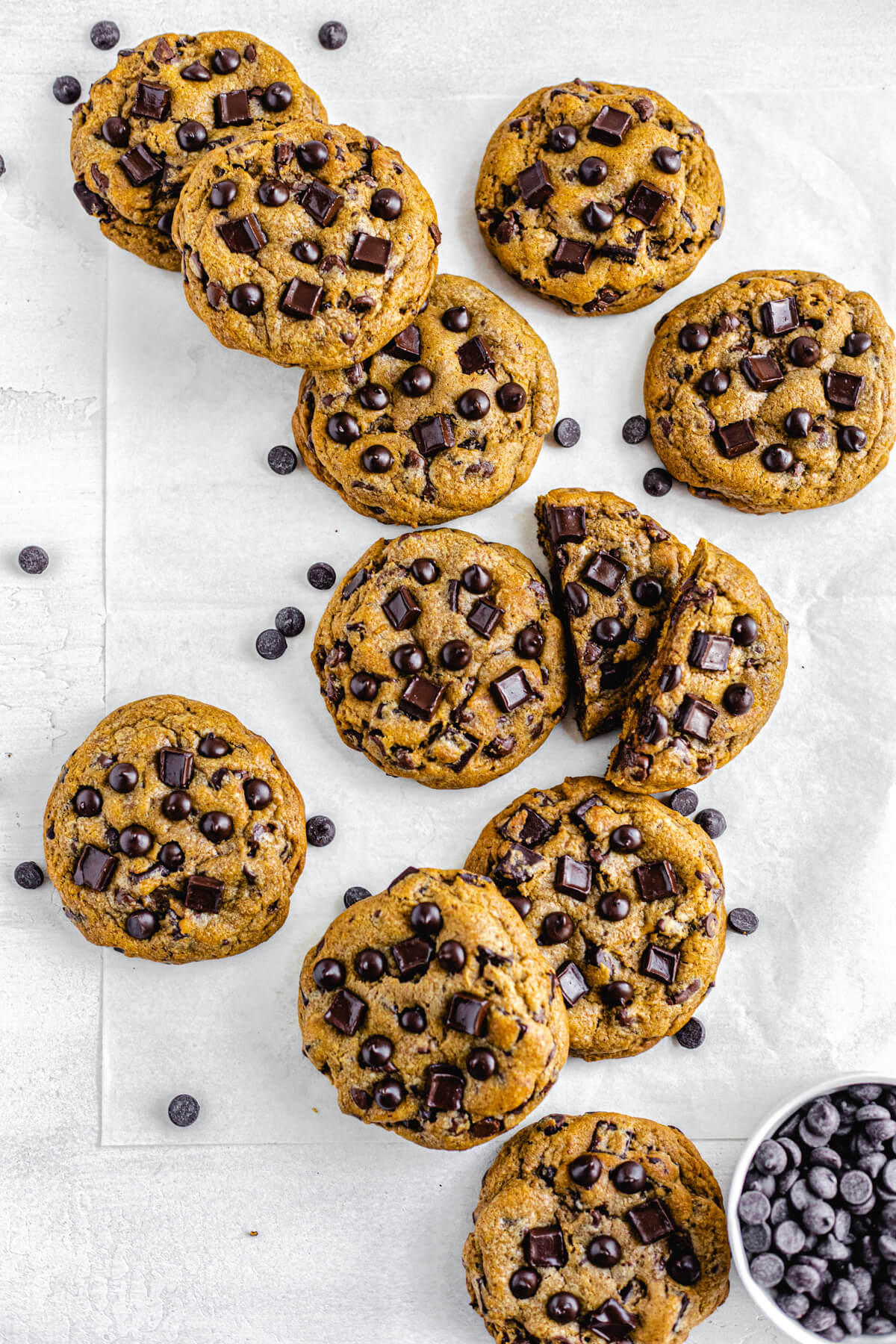 overhead view of cookies with a small bowl of chocolate chips on the bottom
