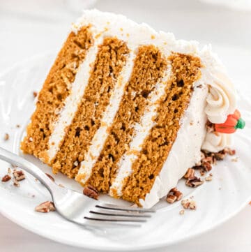 slice of pumpkin cake on a white plate