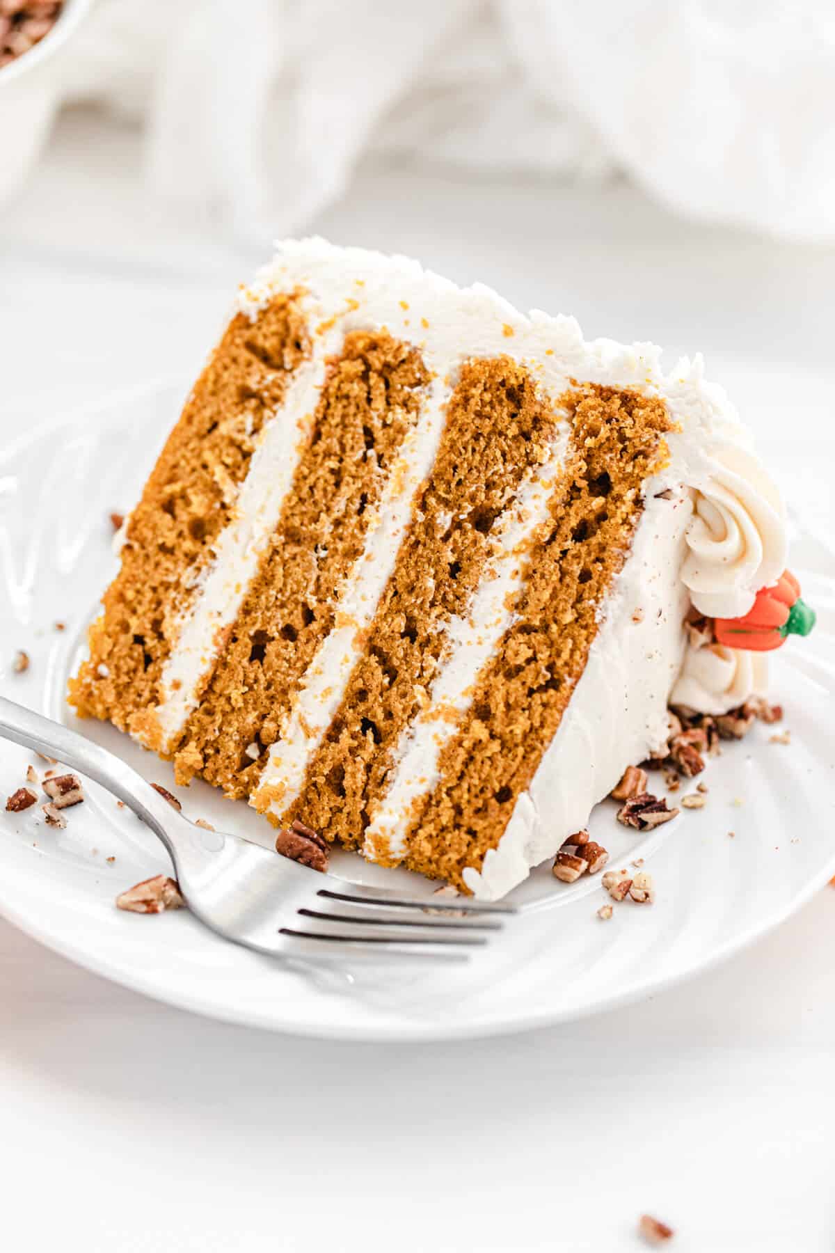 slice of pumpkin cake on a white plate