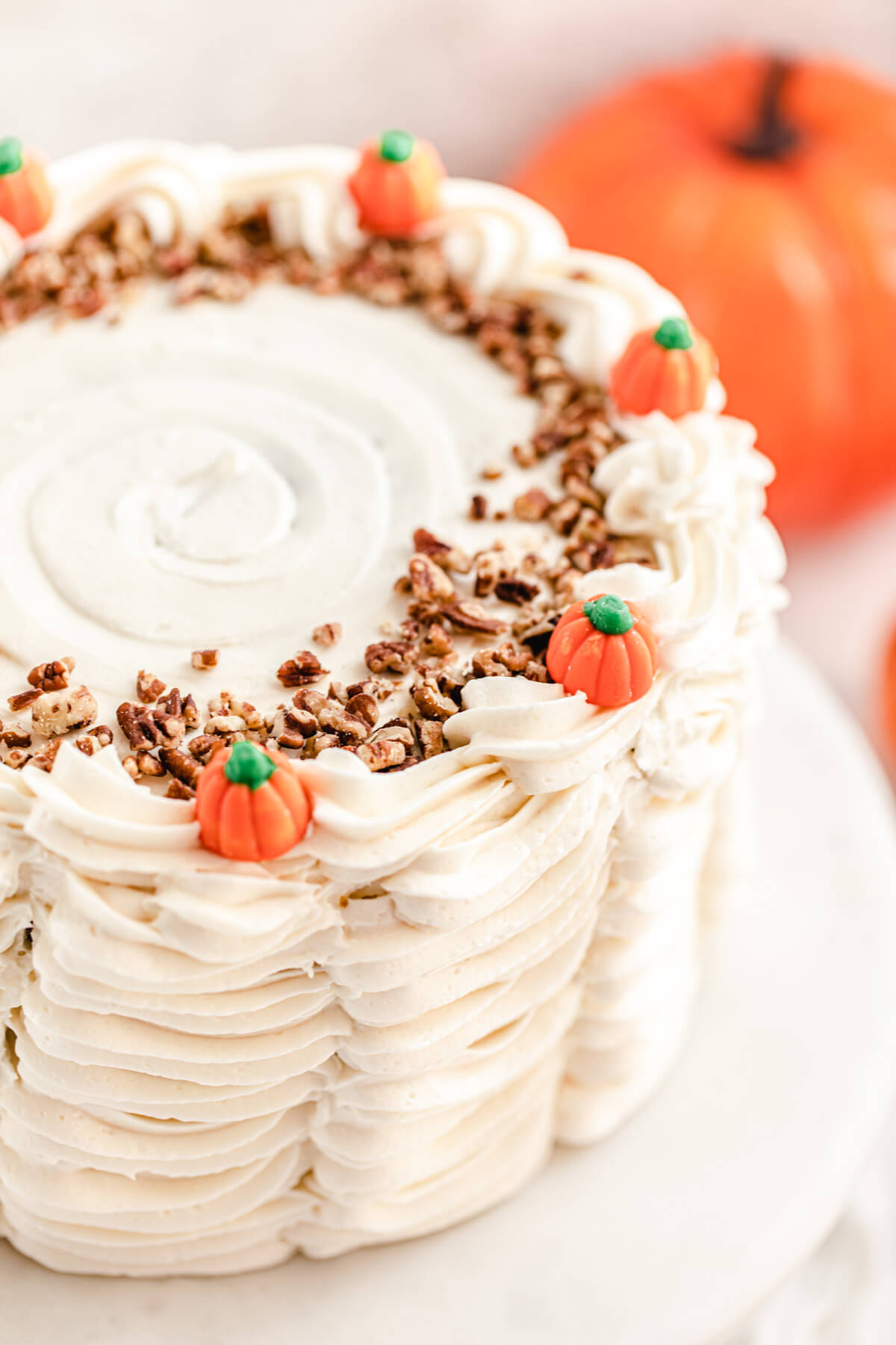 close up of cake on a marble cake stand