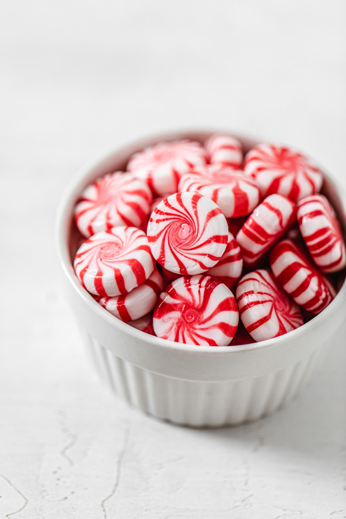 peppermint candies in a white ramekin
