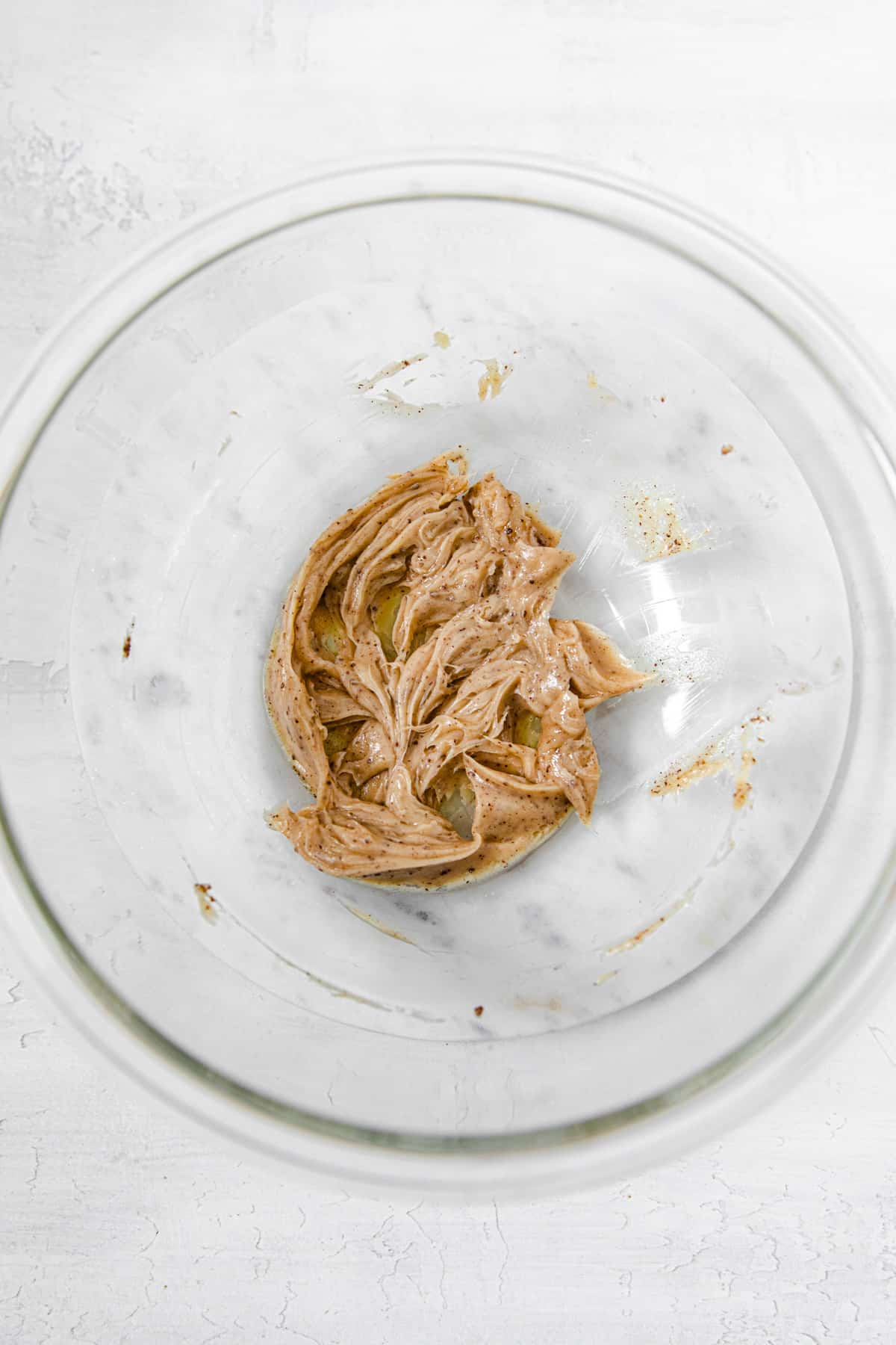 softened brown butter in a glass mixing bowl