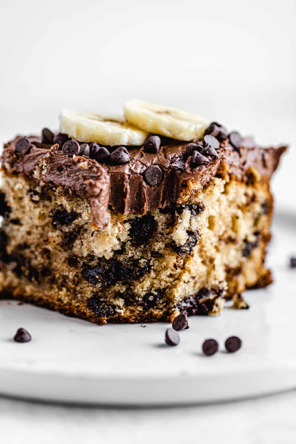 close up of slice of cake on a white plate